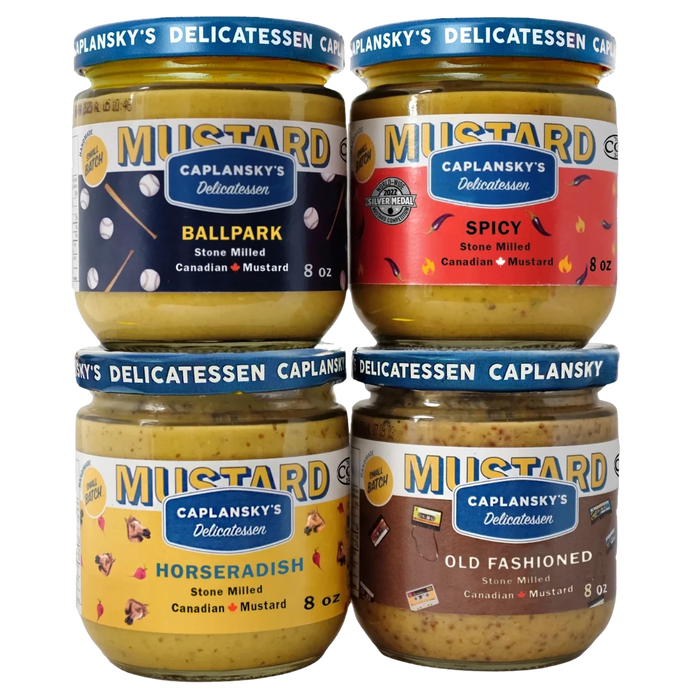 Four Caplansky's mustard jars